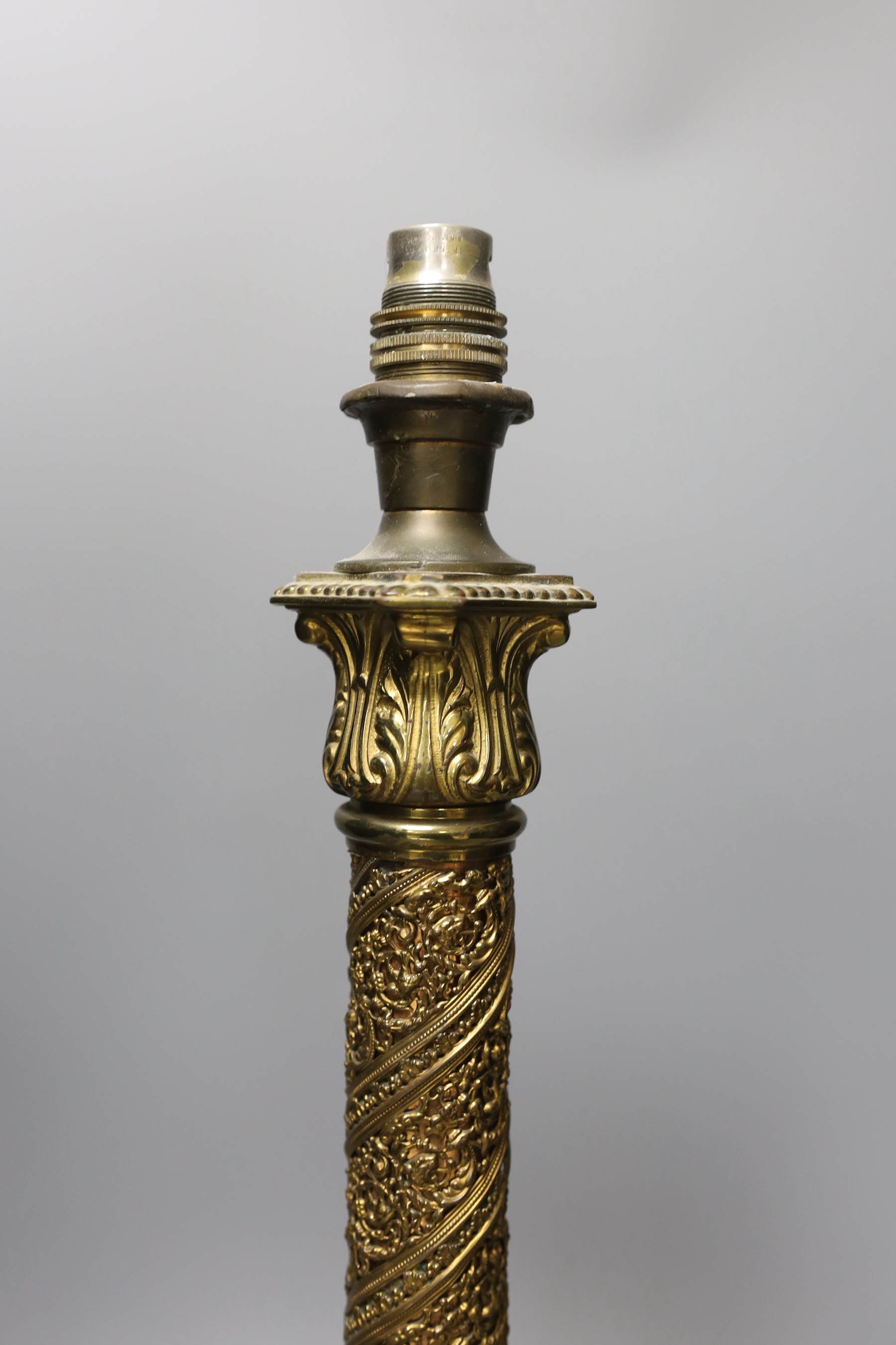 An Edwardian brass table lamp - 47cm high